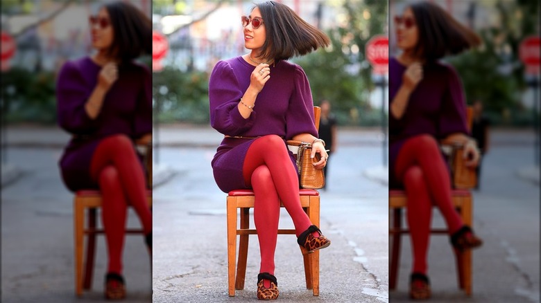 Woman's contrasting sweater-dress-and-tights combo