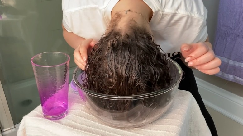 Woman's head in bowl