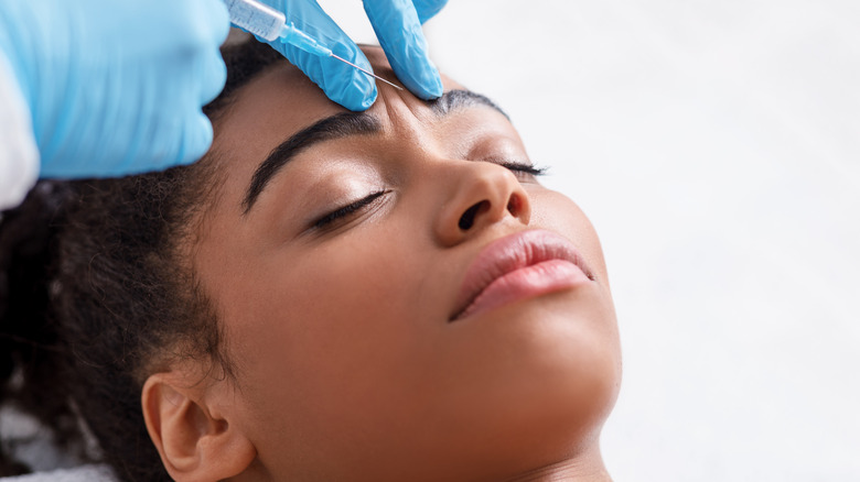 woman getting forehead botox