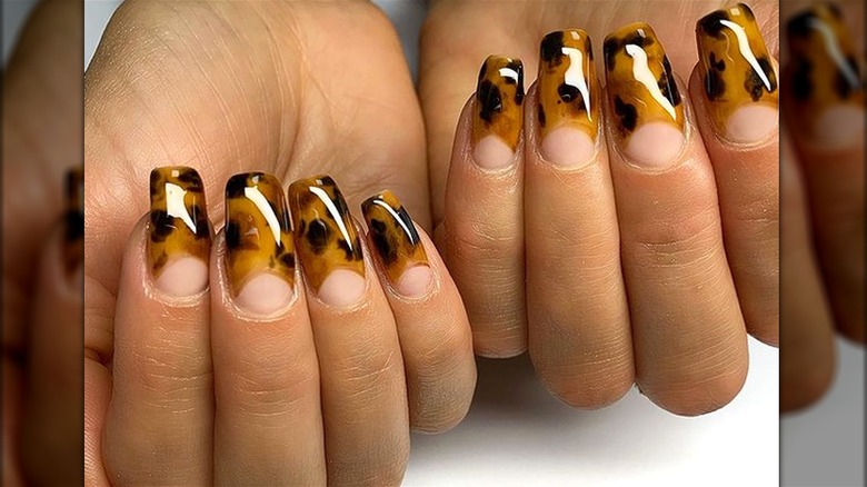 Tortoiseshell nails with clear half moons