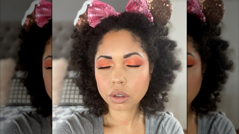 Woman with orange eyeshadow