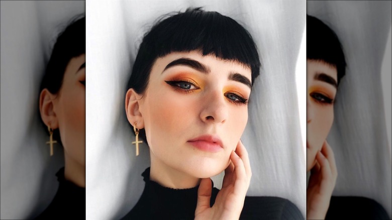 Woman wearing orange blush