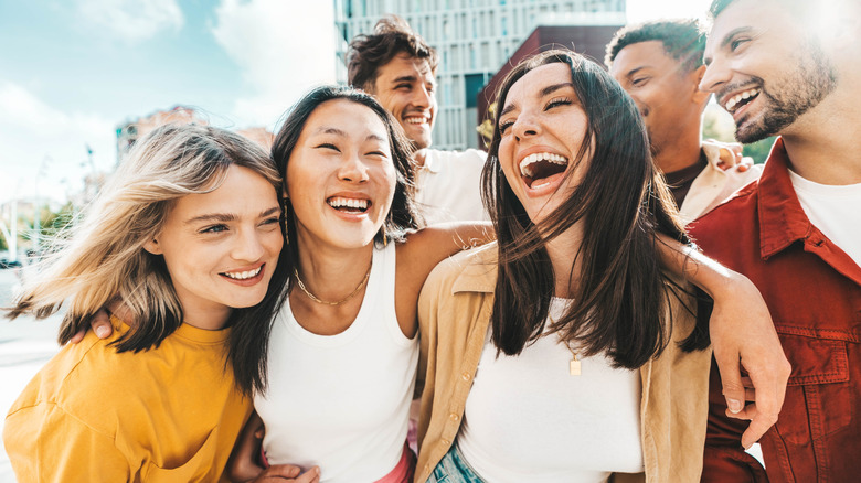 group of happy women hanging out