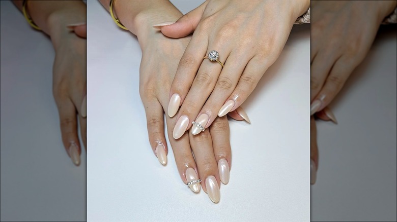 Vanilla chrome nails with rhinestones