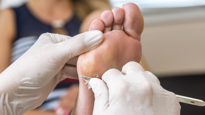 Woman getting pedicure