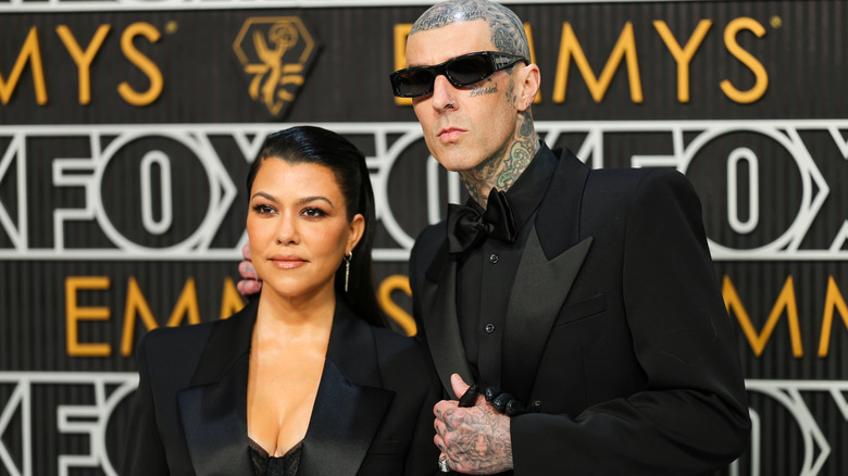 Koutney Kardashian and Travis Barker on the red carpet