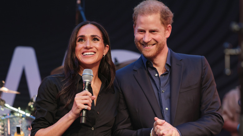 Harry and Meghan smiling