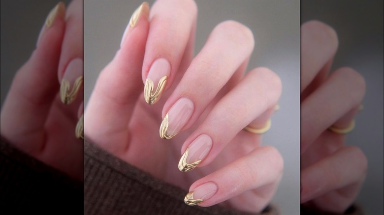 Gold tipped nails