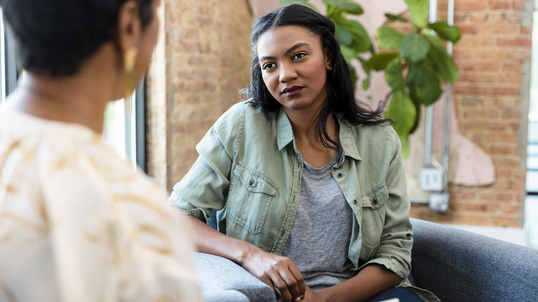 Woman speaking to a therapist