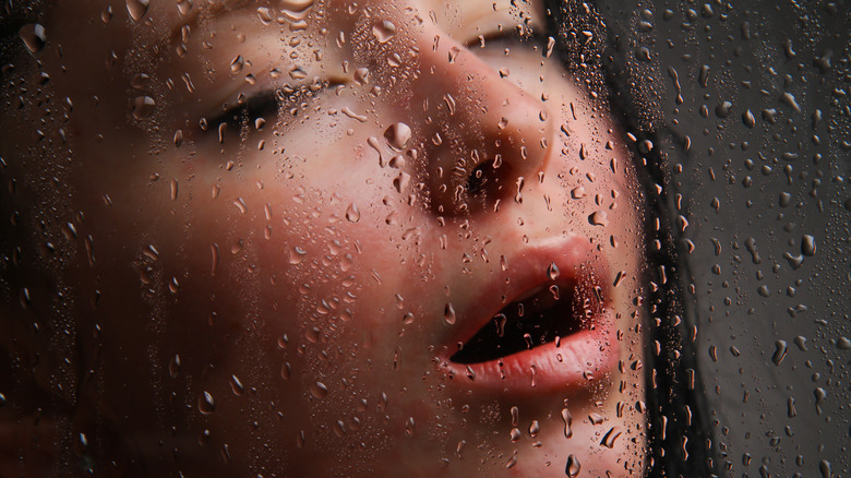 Woman having pleasurable shower