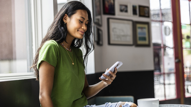 Woman looking at her phone