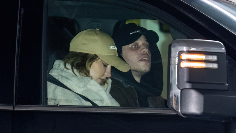 Madelyn Cline and Pete Davidson in a car