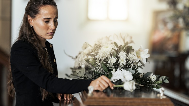 woman mourning at funeral