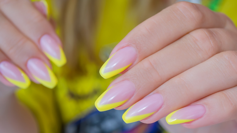 a yellow tip manicure