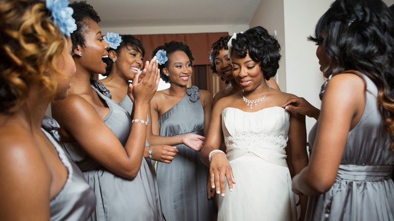 Bridal party gathered together 