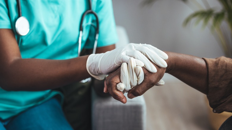 Medical professional wearing gloves