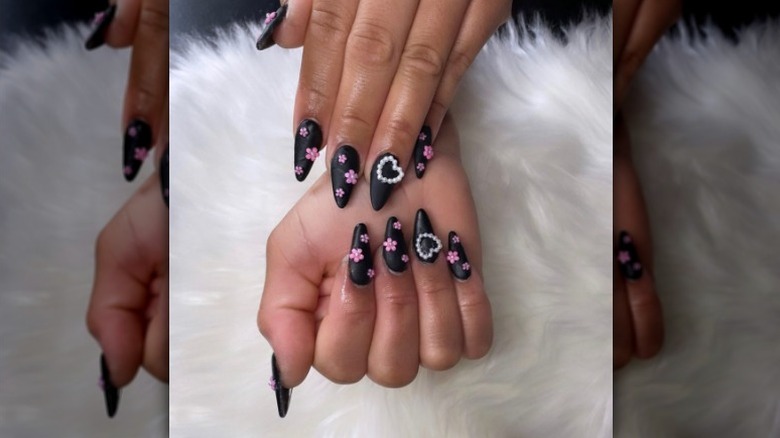 Black nails with pink flowers