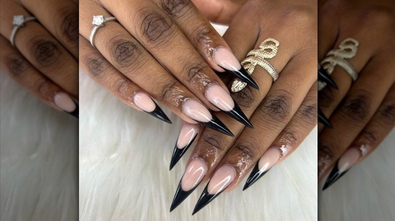 Long pointed black french manicure