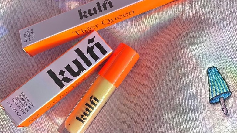 Kulfi Beauty products flat lay 