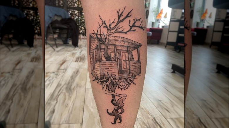 Illustrative tattoo on leg