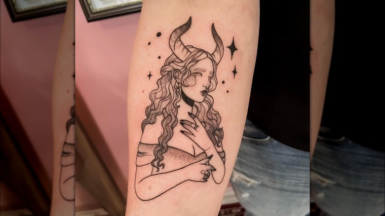 Tattoo representing Taurus on arm