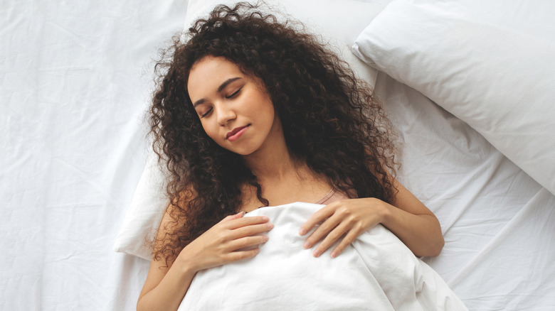 woman in bed peaceful