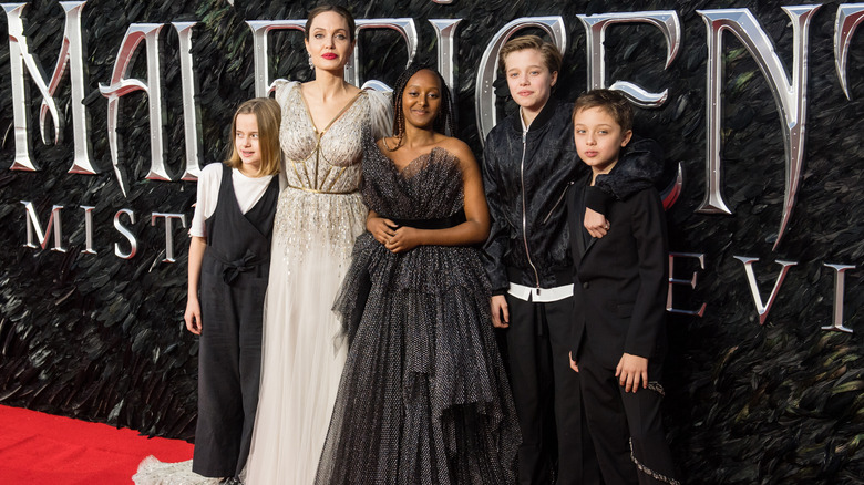 The Jolie family, including Zahara in a black, tulle gown with her siblings and Angelina Jolie