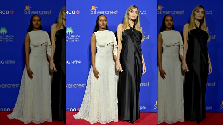 Zahara Jolie in a white gown with Angelina Jolie in a black gown in Palm Springs